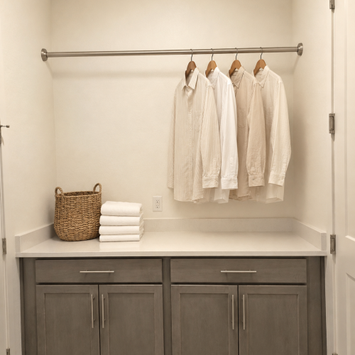 CDO Laundry Room Cabinet across from washer and dryer. Stagged